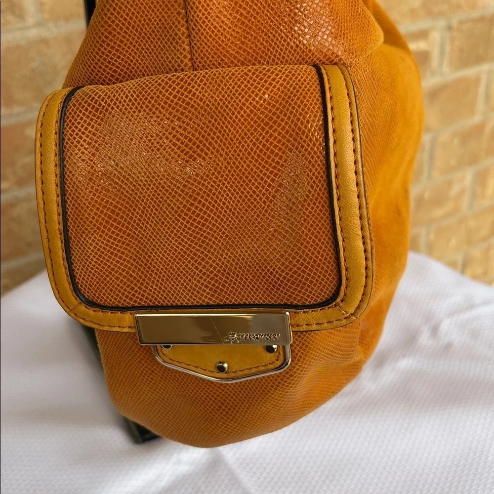 B. Makowsky Orange Hobo Bag